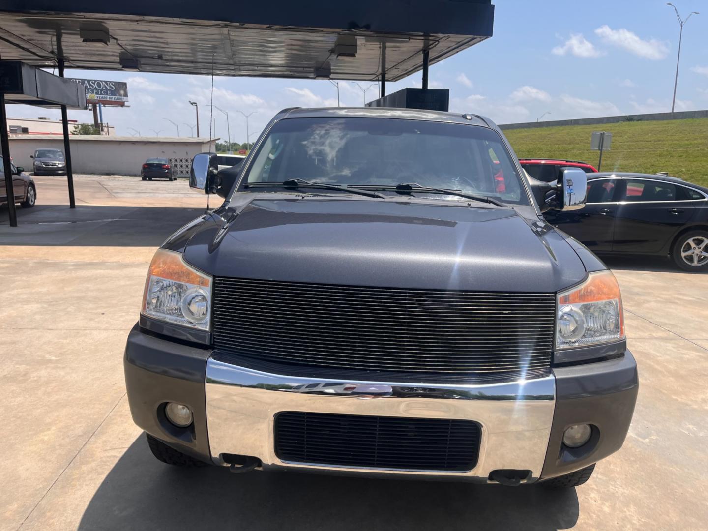 2011 GRAY NISSAN TITAN S; SL; PRO-4X; PRO-4X Crew Cab 4WD SWB (1N6AA0EC2BN) with an 5.6L V8 DOHC 32V engine, 5-Speed Automatic transmission, located at 8101 E. Skelly Dr., Tulsa, OK, 74129, (918) 592-3593, 36.121891, -95.888802 - Photo#5